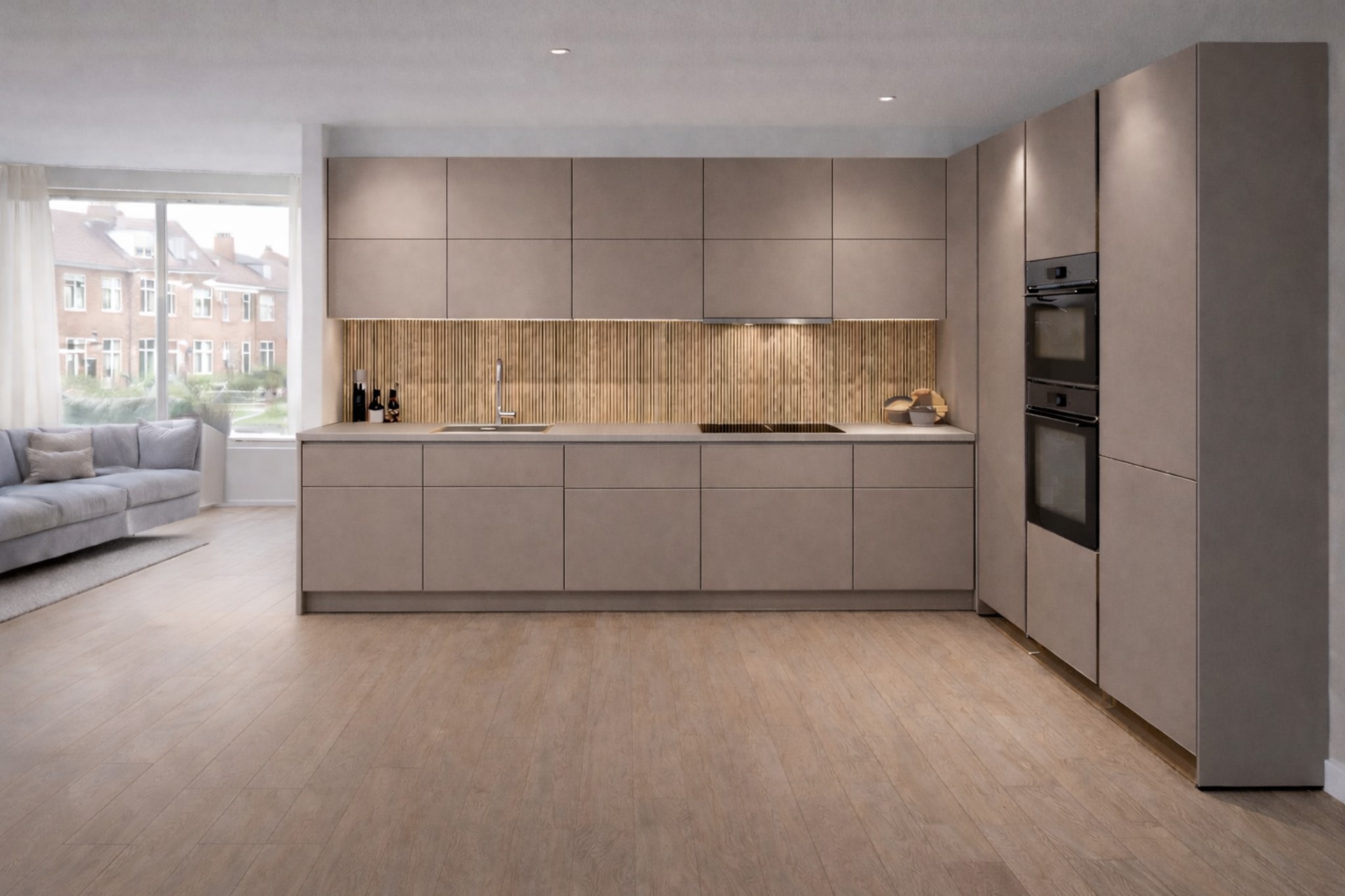Moderne Kitchen4All Nordic warm L-keuken met matte beige fronten en een grijs composiet werkblad.