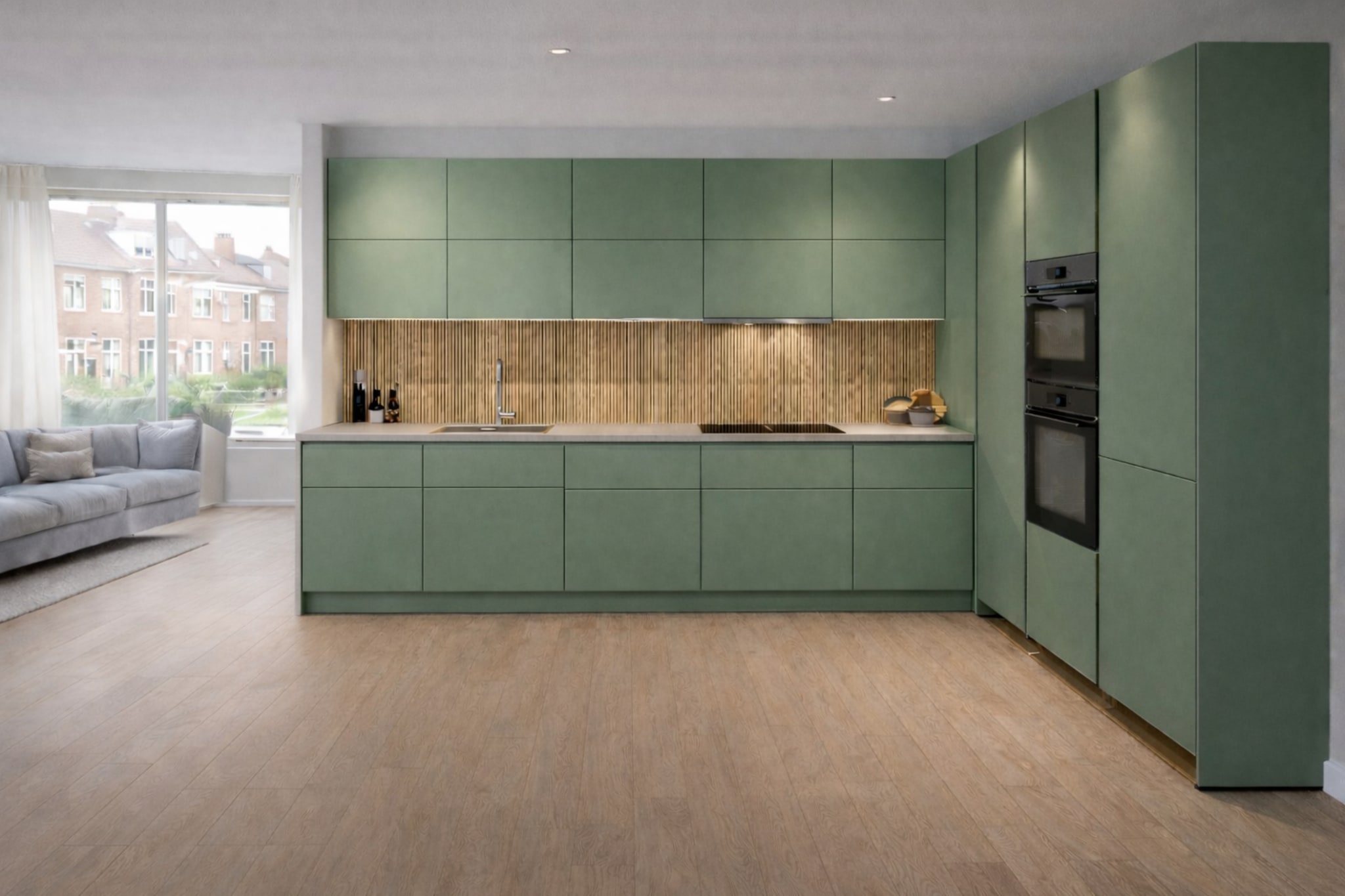 Moderne Kitchen4All L-keuken Nordic warm met matte groene greeploze fronten en houtlook werkblad.