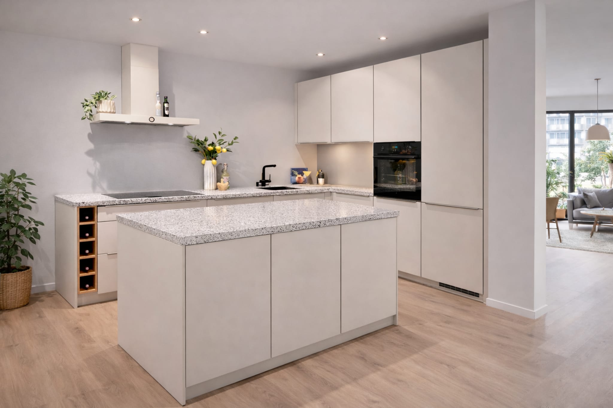 Moderne witte greeploze Terrazzo stoer eilandkeuken met mat egale fronten en composiet werkblad.
