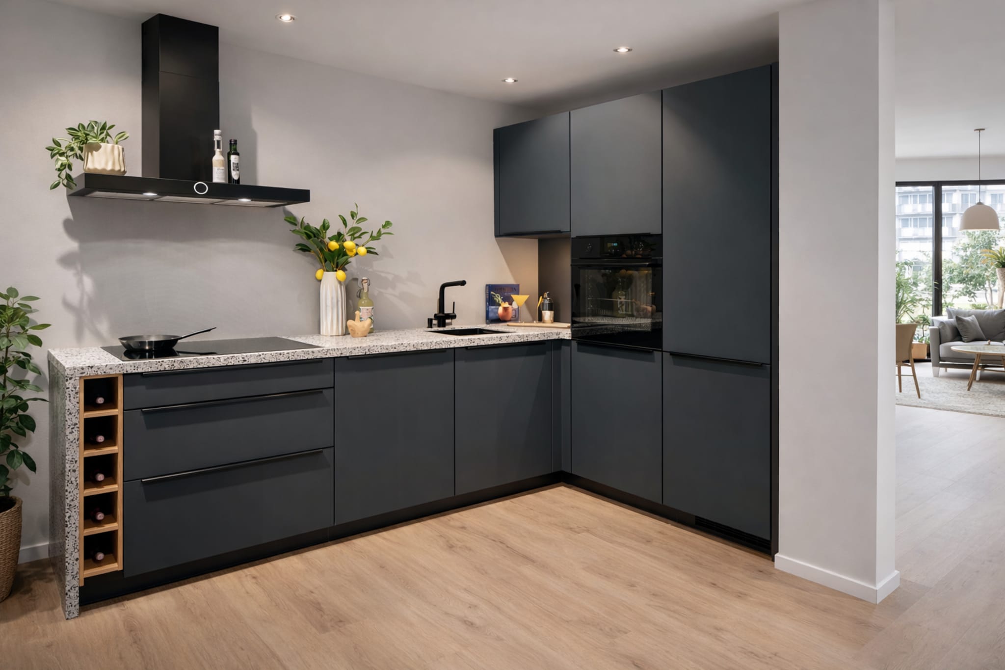 Moderne L-keuken Terrazzo stoer met matte donkergrijze fronten en een donkergrijs composiet werkblad.