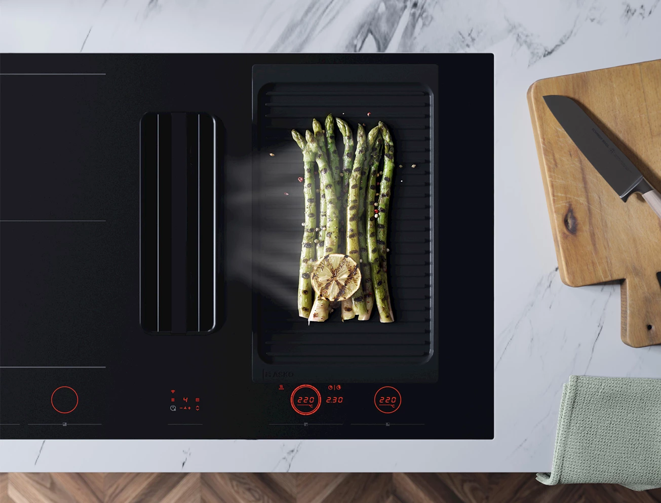 Ingebrande vlekken inductiekookplaat schoonmaken